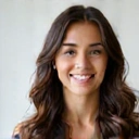 Portrait of a female content creator smiling.