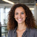 Portrait of a female marketing specialist with a friendly smile.